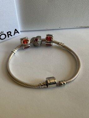 Pandora Sterling Bracelet with Red and Orange Heart Charms